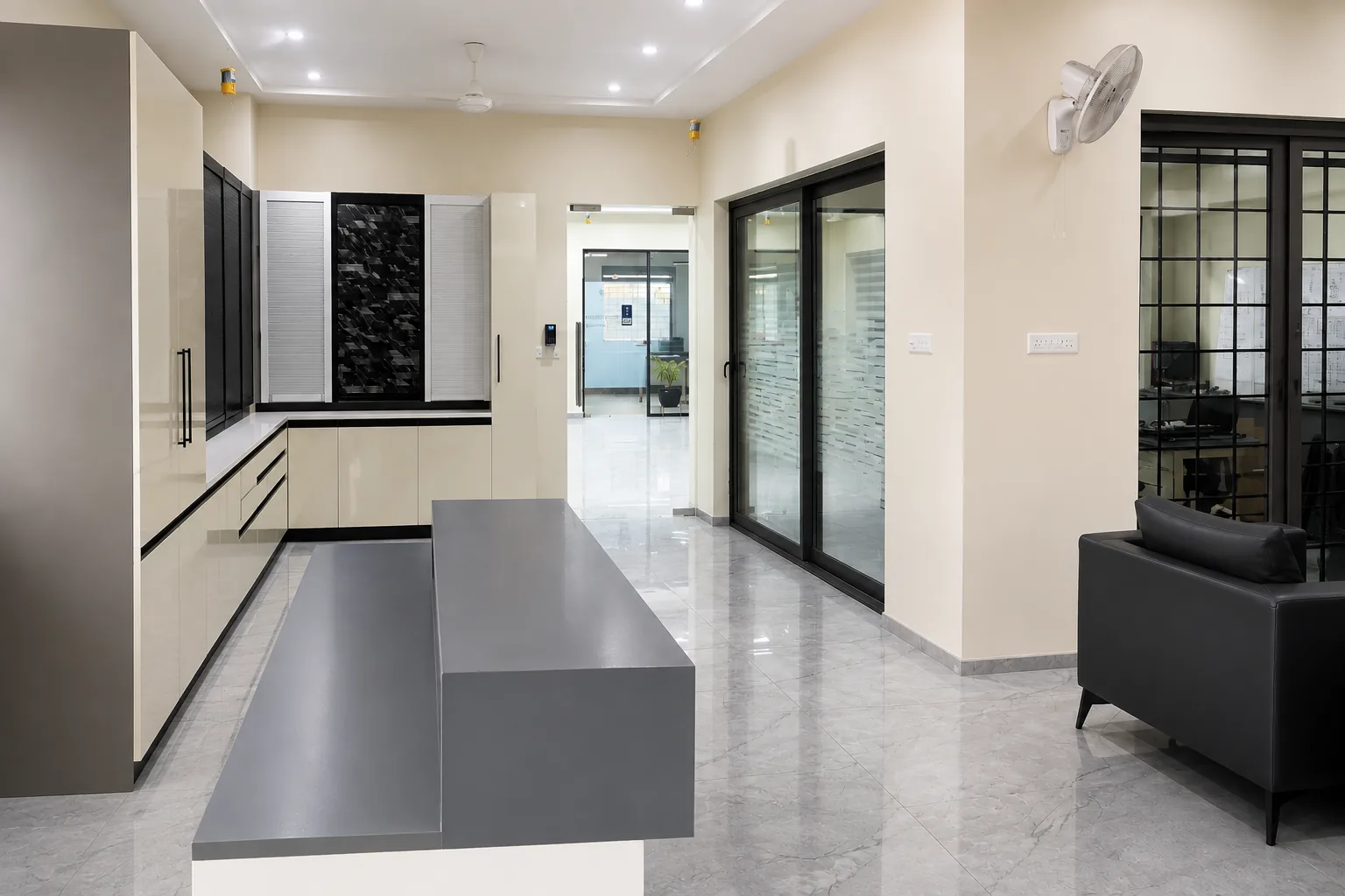 SATORI showroom display of open-kitchen rolling shutter finishes